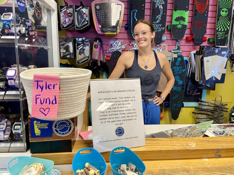 Dewey Beach Surf Shop Manager Lauren Kelley said customers have flocked to the store to purchase items and donate funds to support Tyler Hudson. The shop has seen record sales, she said. ELLEN DRISCOLL PHOTO